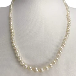 Collier en chute d'occasion or 750 jaune maille perles perle de culture