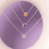 Collier or 375 blanc topaze traitée sky blue et zirconias 45cm