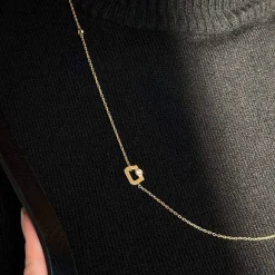 Collier plaqué or jaune boucles ajourées et zirconias
