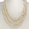 Collier triple rang d'occasion or 750 blanc perles de culture du Japon 55 cm