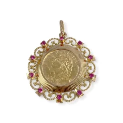 Médaille d'occasion or 750 jaune Helvetia rubis synthétiques