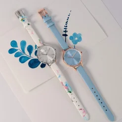 Montre femme chromée bracelet cuir fleurs tropicales