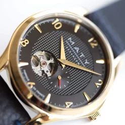 Montre homme coeur ouvert automatique acier doré bracelet cuir noir