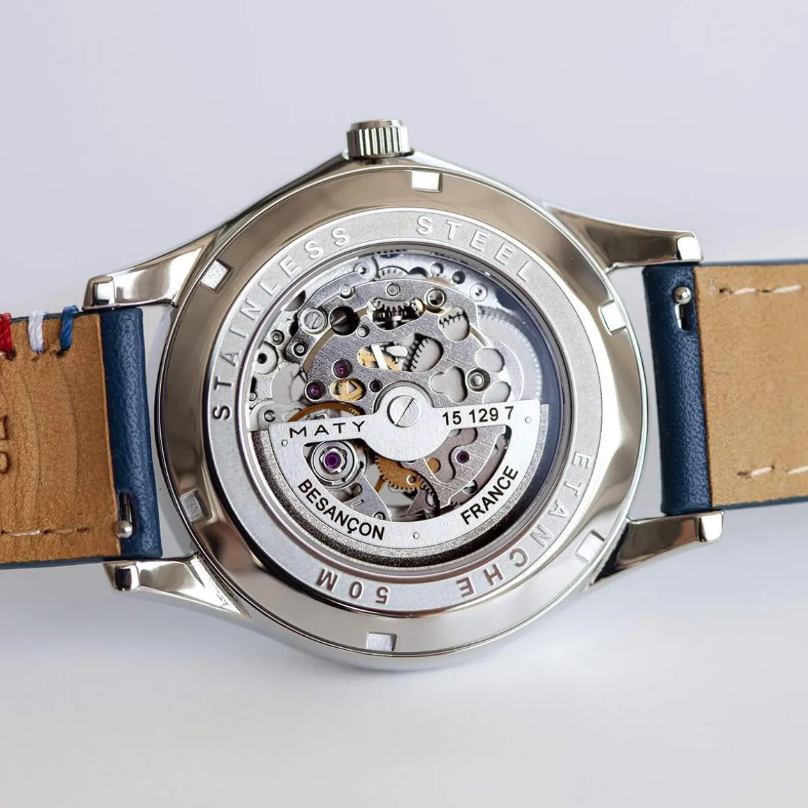 Montre homme squelette automatique acier bracelet cuir bleu