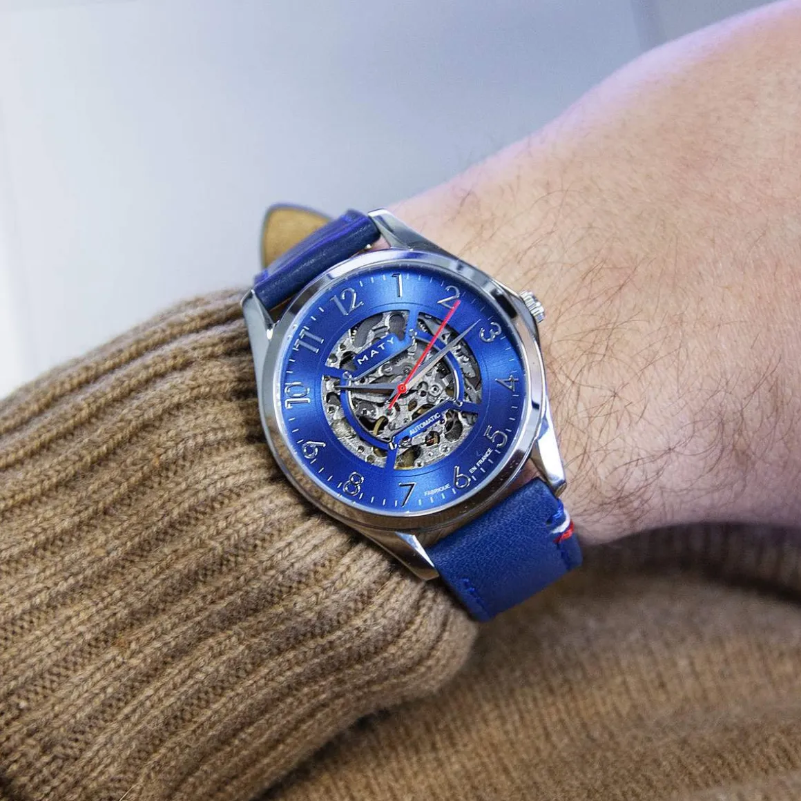 Montre homme squelette automatique acier bracelet cuir bleu