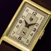 Montre Lip homme acier doré cuir marron