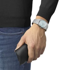 Montre TISSOT PRX POWERMATIC homme automatique cadran bleu clair bracelet gris