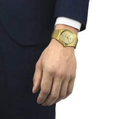 Montre TISSOT T-CLASSIC PRX homme cadran champagne bracelet PVD doré